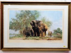 A large framed limited edition print of elephants
