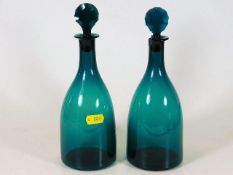 Two Georgian glass decanters one with faults