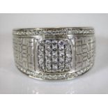 A large 18ct white gold ring set with diamond 22.7g