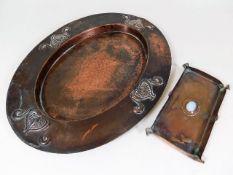 An art nouveau copper tray twinned with arts & cra