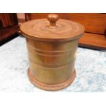 A brass shell tobacco jar
