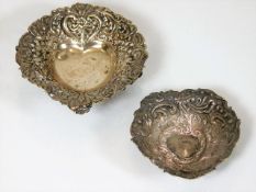 Two decorative pressed silver trinket dishes