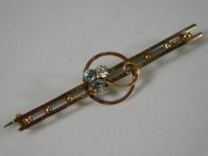 A 9ct gold antique brooch with steel pin set with