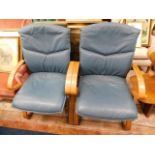 Two vintage retro leather chairs
