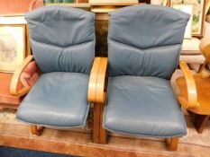 Two vintage retro leather chairs