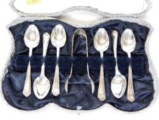 A cased teaspoon & tongs set