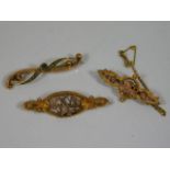 Three 9ct gold brooches with metal pins 6.3g