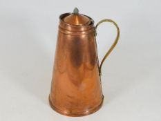 An English arts & crafts copper water carrier with Bensons Patent to brass handle