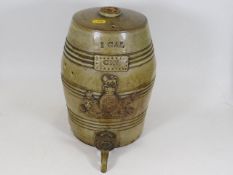 A 19thC. stoneware Gin flagon & brass tap