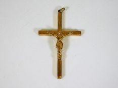 A 9ct gold crucifix 9.5g 2in tall