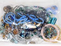 A bagged quantity of costume jewellery