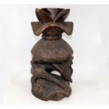 A 19thC. African tribal art carved light wood cere