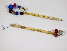 A pair of lace bobbins inscribed Nancy & John