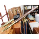 A brass telescope & tripod