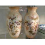 A pair of decorative English pottery vases