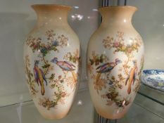 A pair of decorative English pottery vases