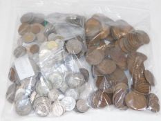 A quantity of mixed white metal & brass coinage
