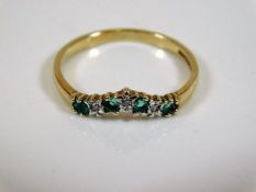 A 9ct gold ring set with emerald & diamonds size O