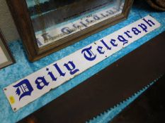 A Daily Telegraph enamel sign