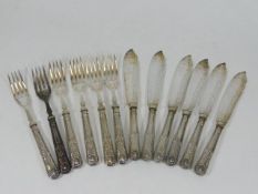 A set of six fish knives & forks with silver Kings