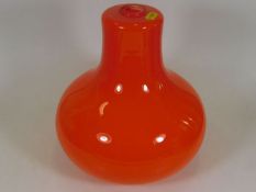 A retro orange lined glass lampshade