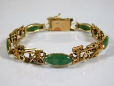 An 18ct gold bracelet set with jade 16.5g