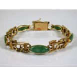 An 18ct gold bracelet set with jade 16.5g