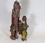 Two African ethnic style carved dolls