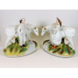 Two Staffordshire pottery cows & figures, one cow