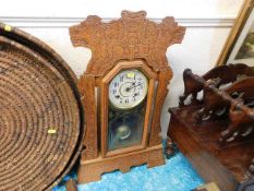 An oak cased American clock