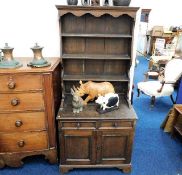 A 1920's oak cupboard & bookcase