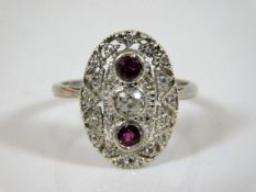 A platinum ruby & diamond ring approx. 0.25ct cent