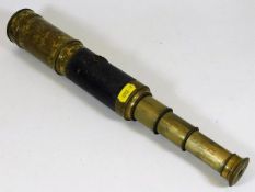 A brass three draw telescope with lens covers, fau