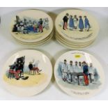 Thirteen Sarreguemines pottery plates with comical