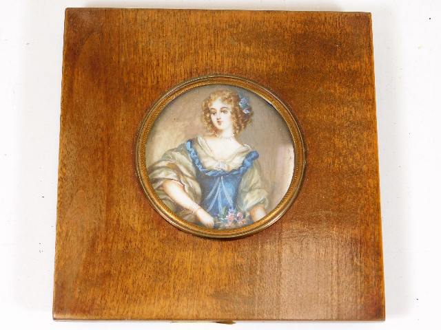 A mahogany mounted watercolour on ivory panel depi