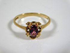 A 9ct gold ring set with amethyst stone size N 1.7