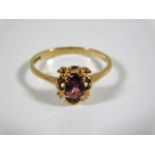 A 9ct gold ring set with amethyst stone size N 1.7