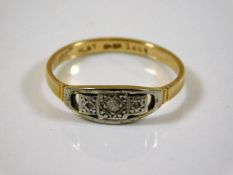 An 18ct gold ring with platinum mounted small diam