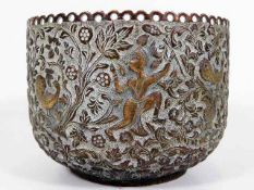 A 19thC. Indian copper bowl with pierced rim & emb