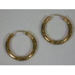 A 9ct gold pair of hoop earrings 1.8g