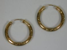 A 9ct gold pair of hoop earrings 1.8g
