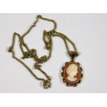 A 9ct gold necklace with 9ct mounted cameo pendant