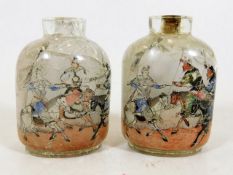 A pair of 19thC. internally painted Oriental rock