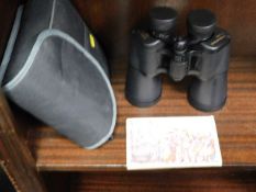 A pair of binoculars & a small quantity of French