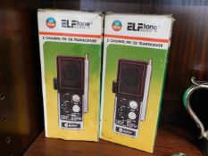 Two boxed two channel CB radios