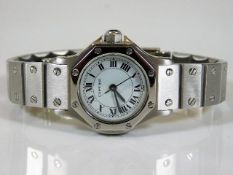 A ladies Cartier Santos wristwatch with stainless