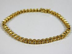 An 18ct gold line bracelet set with 2ct diamonds 1