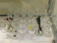 A quantity of glassware twinned with collectable t