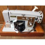 A Read's sail making sewing machine with cover