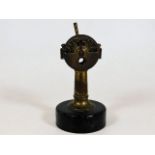 An early 20thC. miniature brass ship telegraph cig